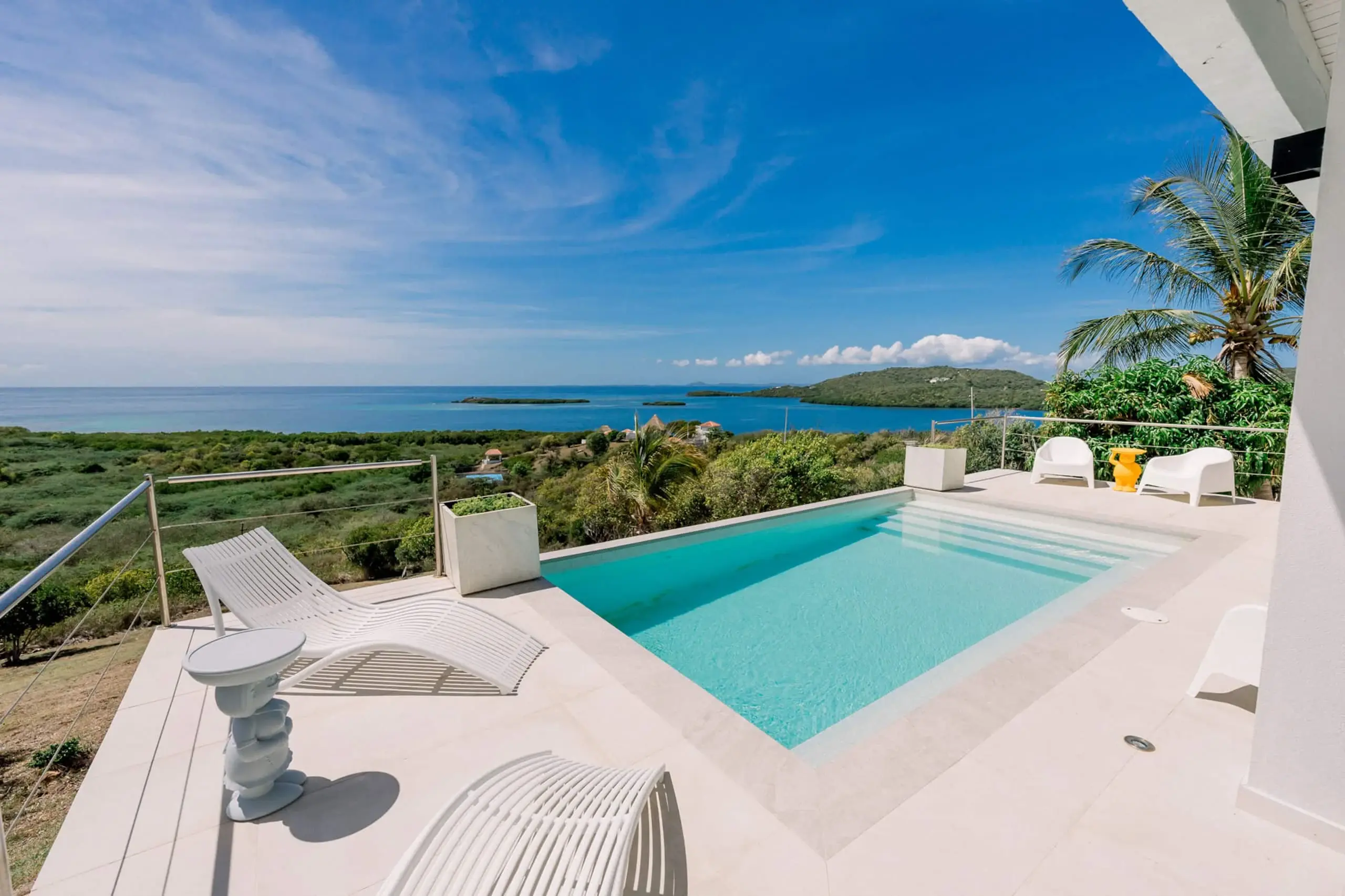 Private pool, loungers and ocean horizon
